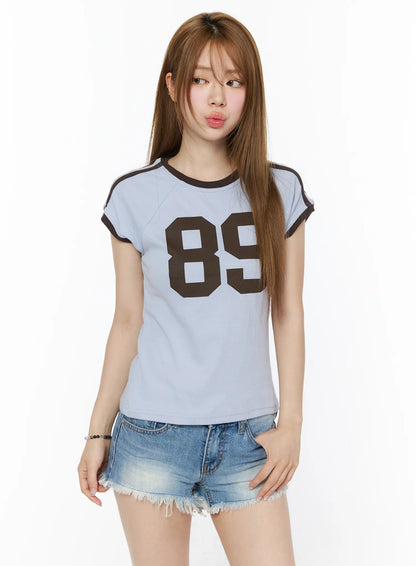 89 Graphic Raglan Short Sleeve Top CU511