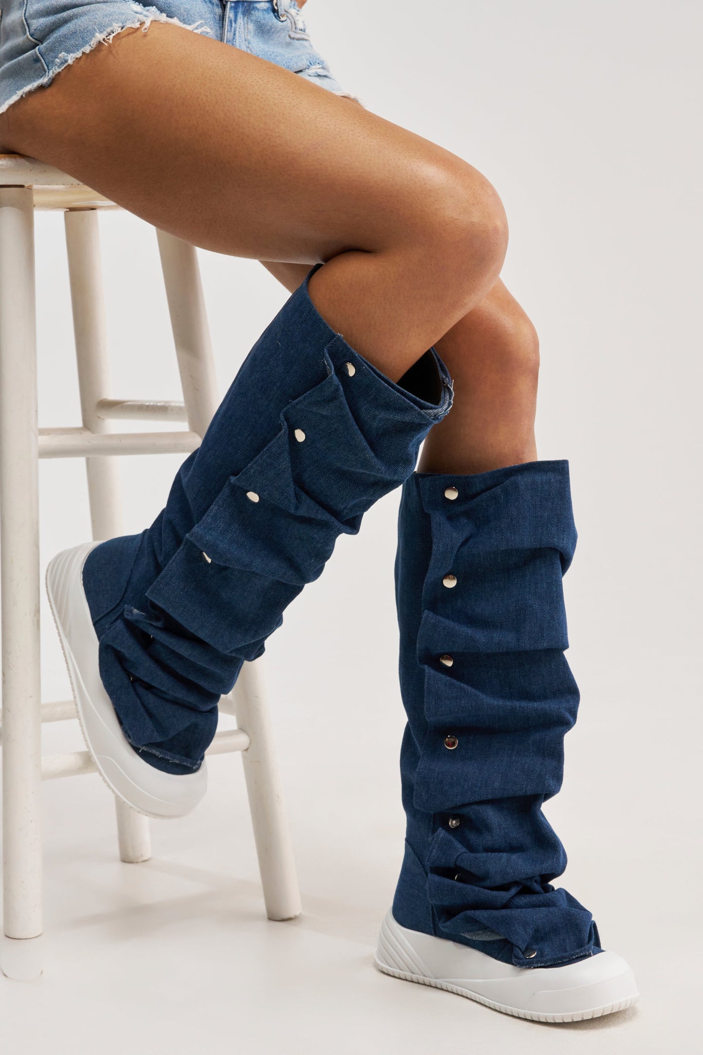 AKIRA GOLD ALIXY DENIM FLAT RUFFLE BOOT